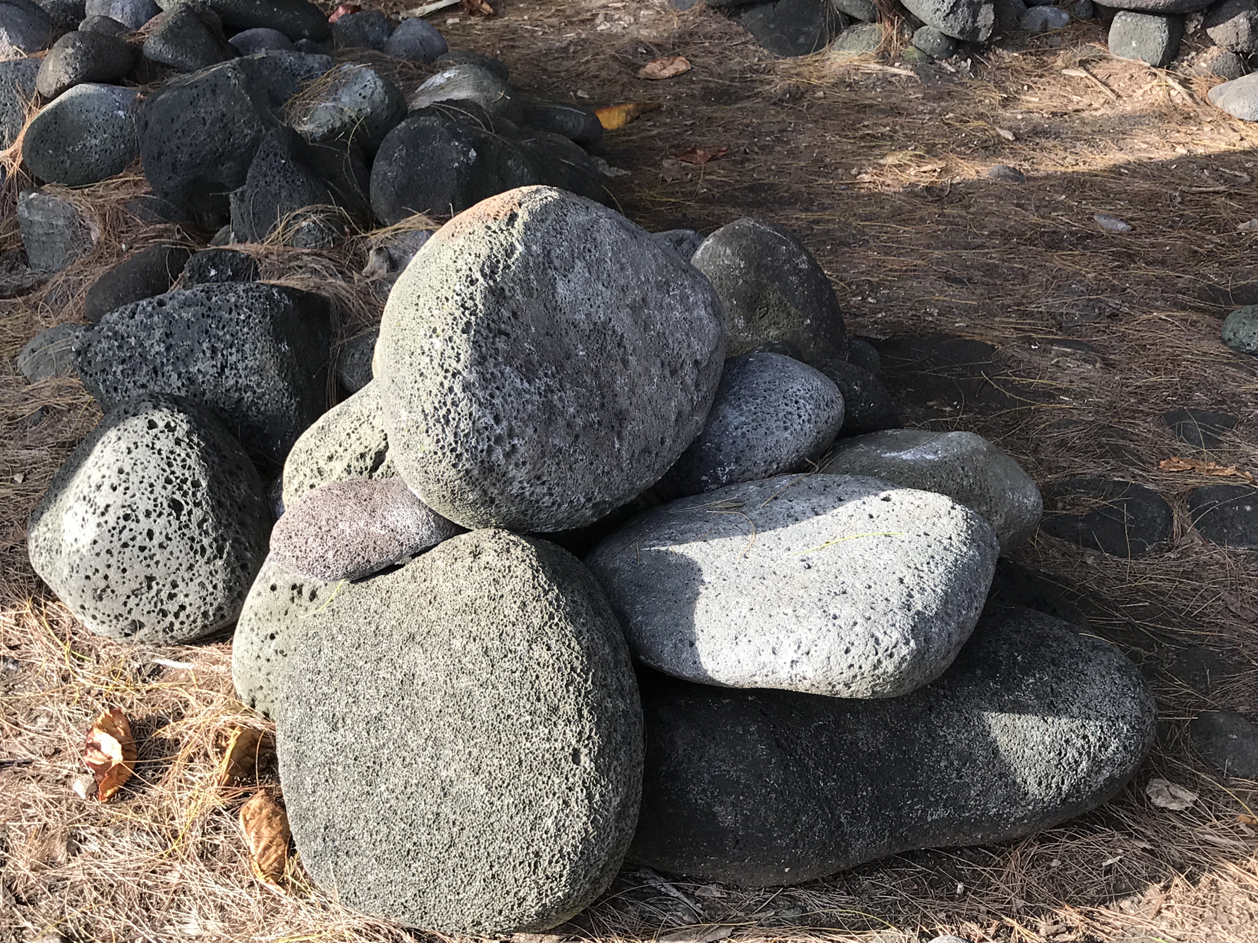 A pile of smooth lava rocks