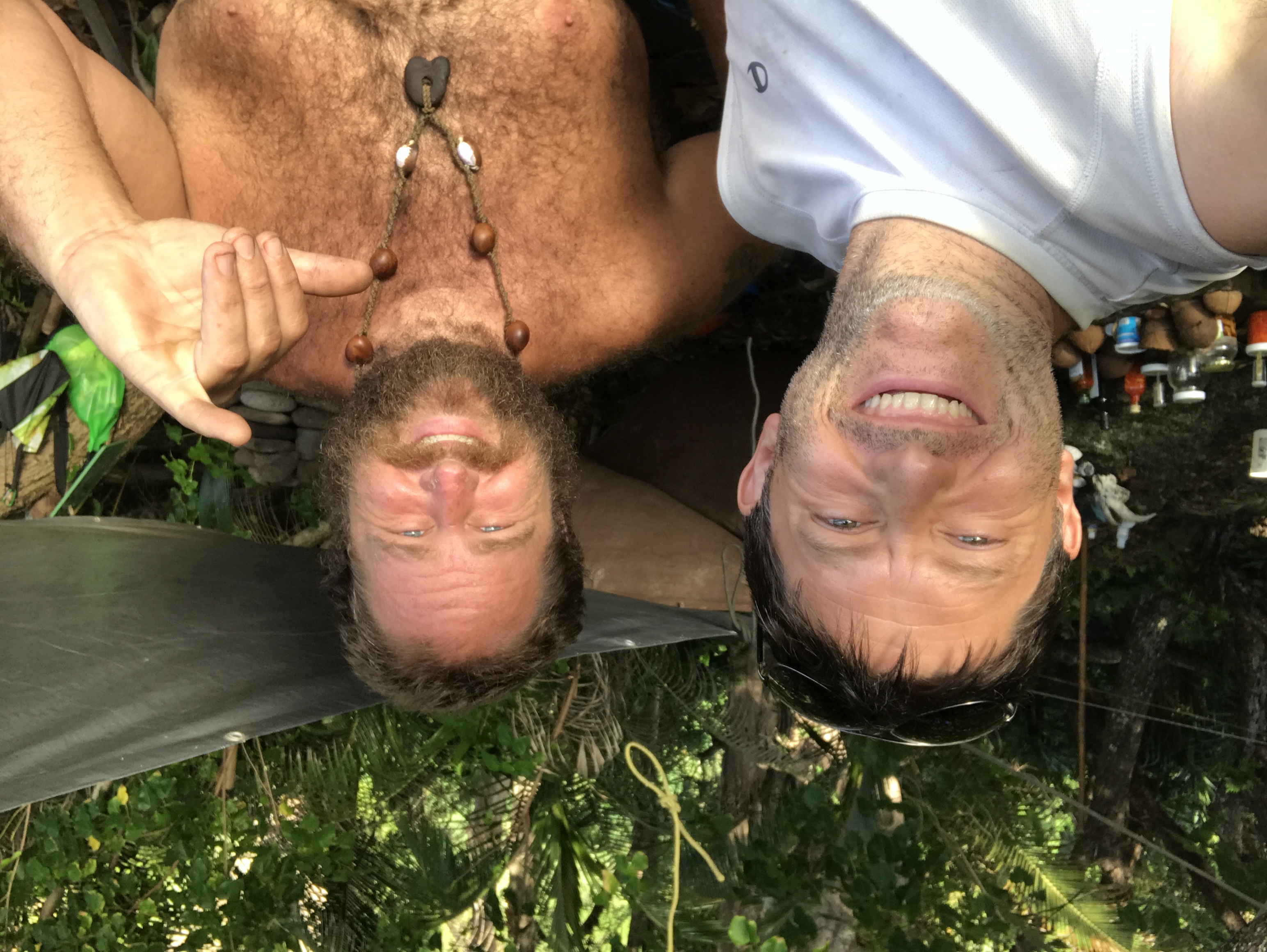 Conor and a friend at camp in the forest