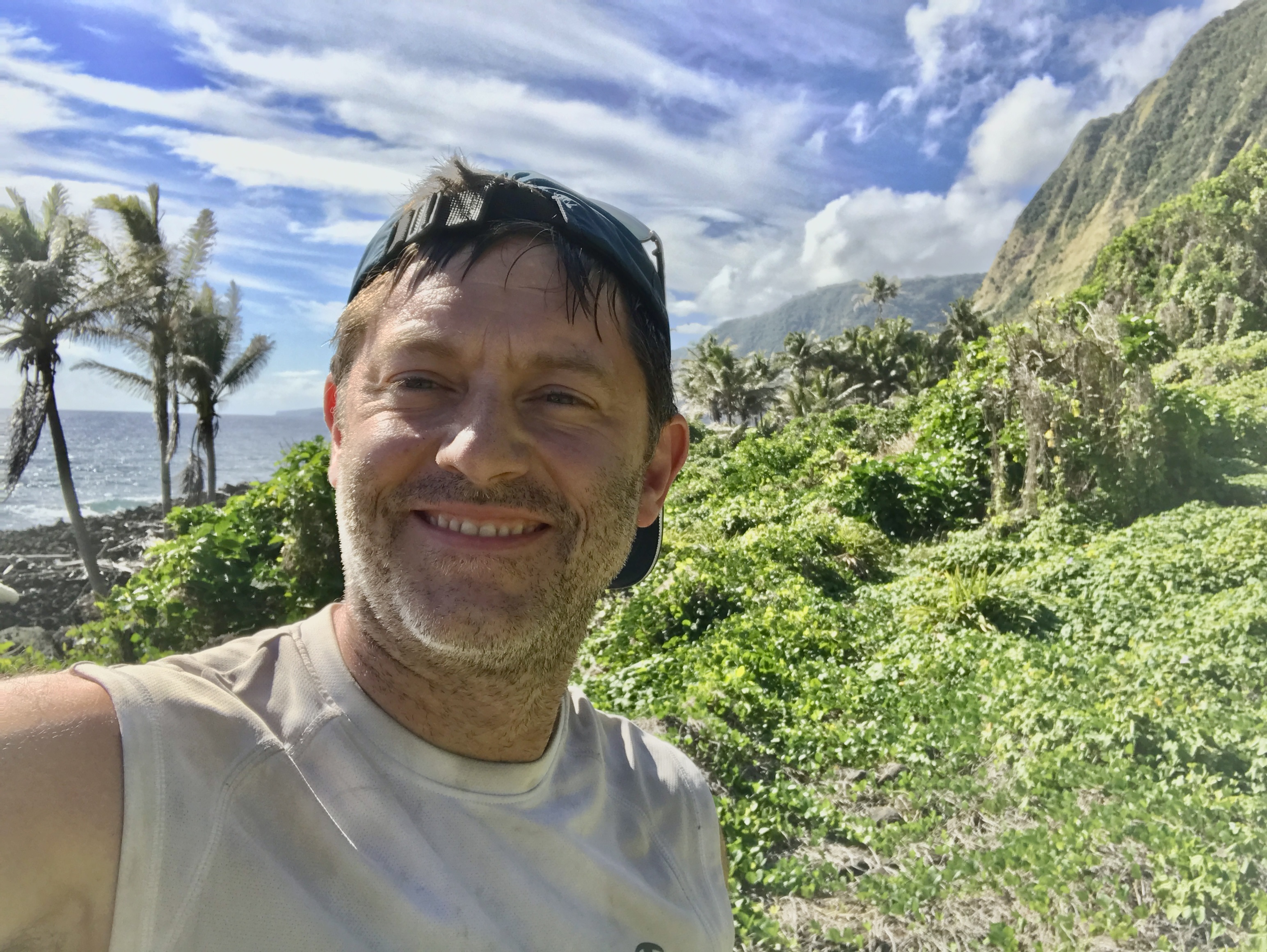 Conor on the cliffside trail above the valley